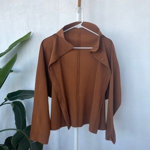 Issey Miyake ME cardigan in tan, with pockets.